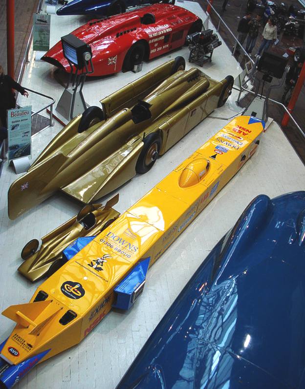 A collection of superb land speed record cars at Beaulieu