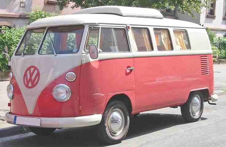 A nice pink an white split screen camper conversion