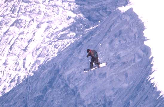 Snowboarding jumper Squaw Valley, California, USA
