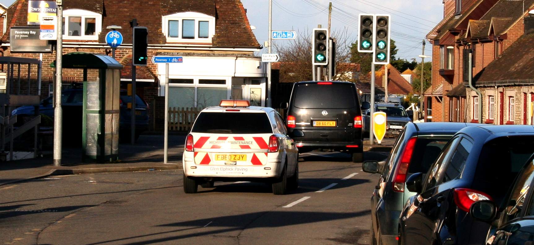 Highways maintenance van driving past the carnage