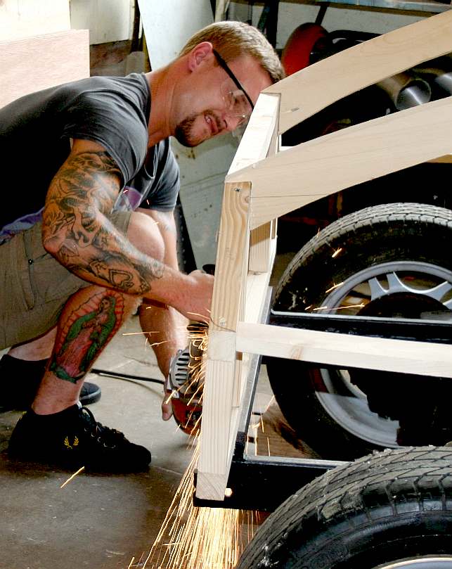 Project co-founder Terry preparing to fit the first of the Ecostar's bodywork