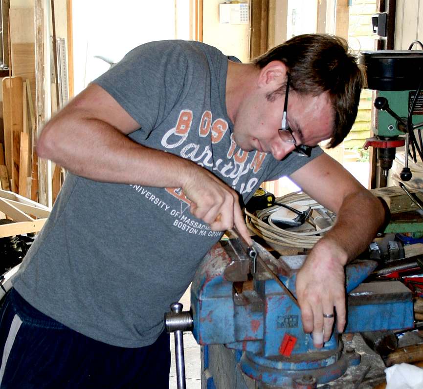 Project leader Chris making a hinge for the gull wing doors