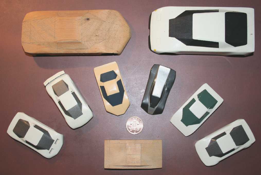 Wood carving, scale model cars hand carved in beech